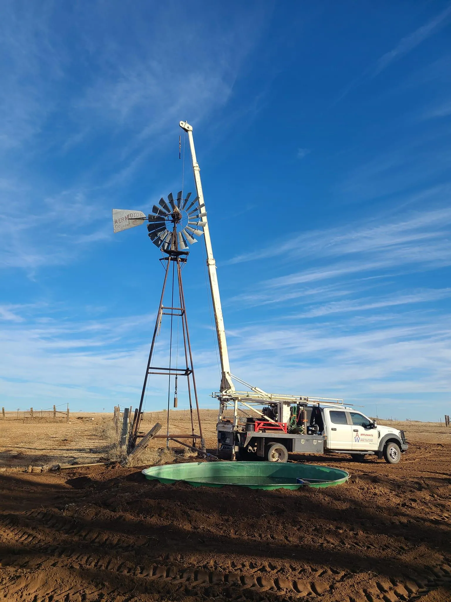 Aermotor windmill and stock tank installation by Applewhite Water Well near Wheeler, Texas